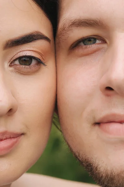 Close up portrait of groom and bride in park. Face to face, hulf face — Stock Photo, Image