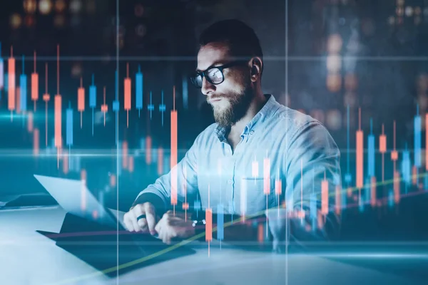 Double exposure.Market traider making analysis of digital market and investment in block chain crypto currency. Red and green candlestick chart and stock trading computer screen background.