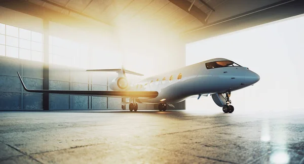 Biznes prywatny samolot odrzutowy zaparkowany w hangarze konserwacji i gotowy do startu. Koncepcja luksusowej turystyki i transportu turystycznego. Renderowanie 3D. — Zdjęcie stockowe