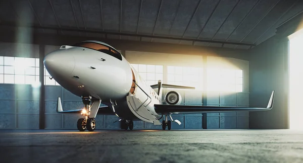 Avión jet privado de negocios estacionado en el hangar de mantenimiento y listo para despegar. Turismo de lujo y viajes de negocios concepto de transporte. renderizado 3d . — Foto de Stock