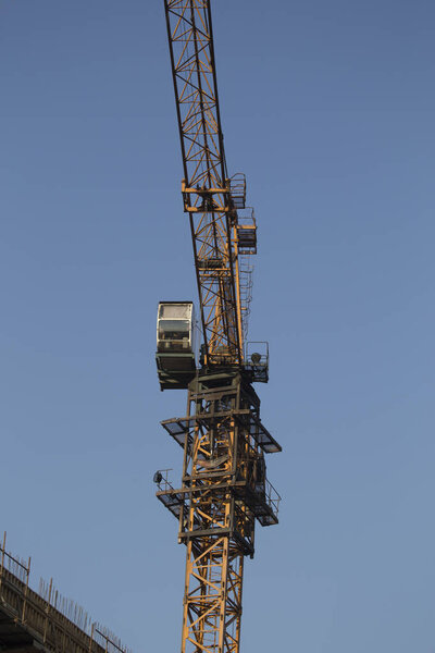 Building a high-rise building with a tower crane