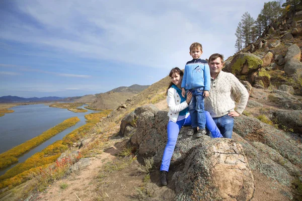 Happy Family Father Mother Son Rest Mountainside Backdrop Valley River — Stock Photo, Image