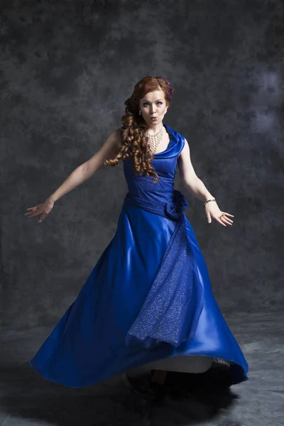 Young woman in classic dress — Stock Photo, Image