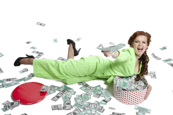 Happy woman with pile of dollars — Stock Photo, Image