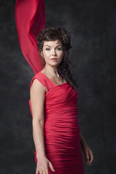 Super woman in red dress — Stock Photo, Image