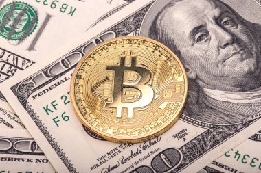 Amerikan dolarlarında altın Bitcoinler. Elektronik para değişimi kavramı
