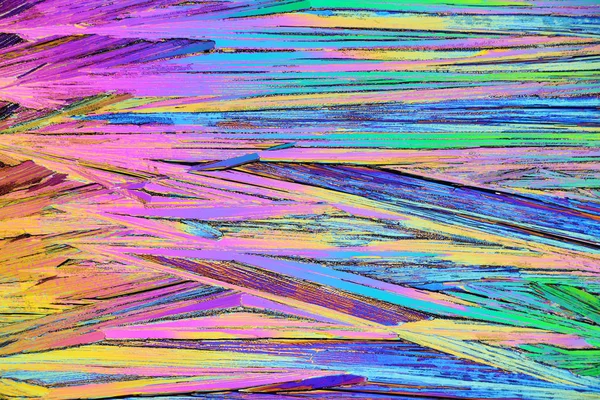 偏振光中的五颜六色的微晶体。照片通过 micr — 图库照片