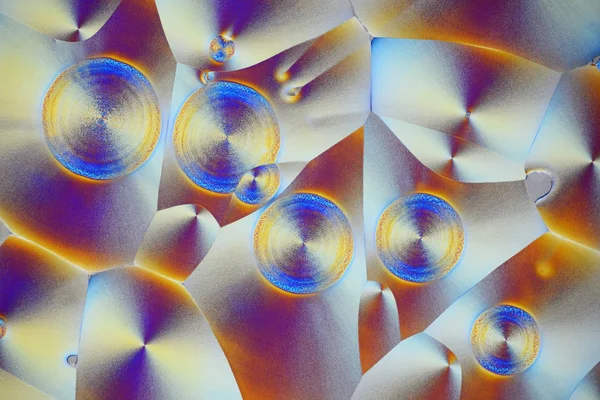 Kolorowy mikro kryształów w światło spolaryzowane. Zdjęcie poprzez micr — Zdjęcie stockowe