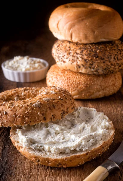 Delicious Whole Grain Bagel Herbed Cream Cheese Rustic Wood Table — Stock Photo, Image