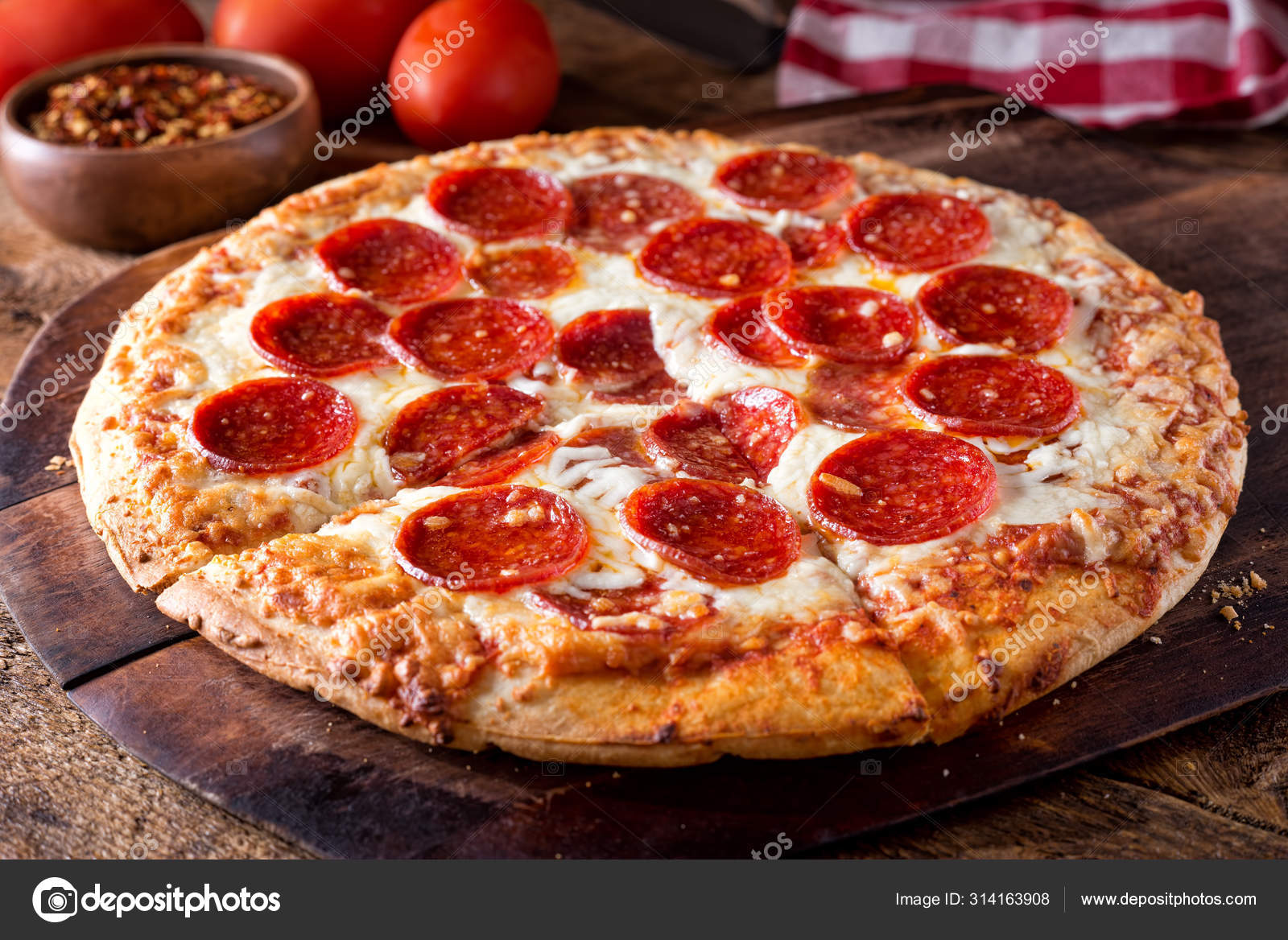 Brick Oven Baked Pepperoni Pizza Stock Photo by ©fudio 314163908
