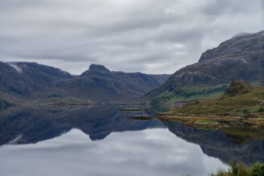 Knockan Crag in the far northwest of Scotland near Ullapool is one of the most important geological sites in Scotland clipart