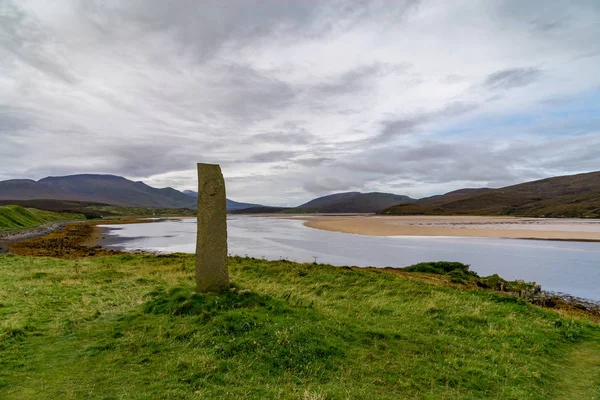 Stone marker on shore of Kyle of Durness, Scotland