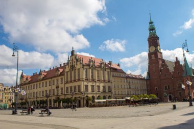 Wroclaw / Poland - April 22 2019: The colorful architecture of the famous Polish city of Wroclaw - Market Square, Town Hall.