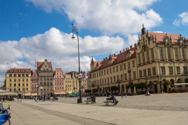 Wroclaw / Poland - April 22 2019: The colorful architecture of the famous Polish city of Wroclaw - Market Square, Town Hall.