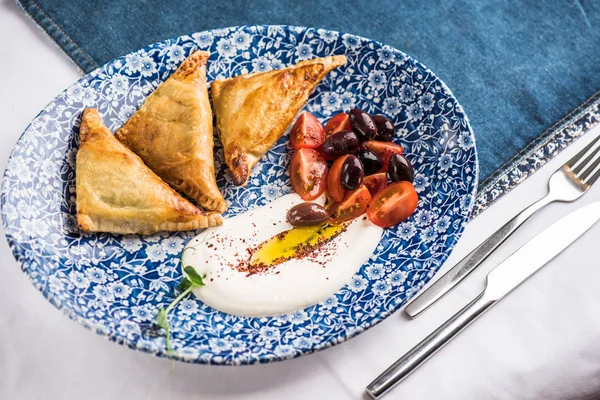 Stuffed Puff Pastry Blue Patterned Plate Tomatoes Sauce — Stock Photo, Image