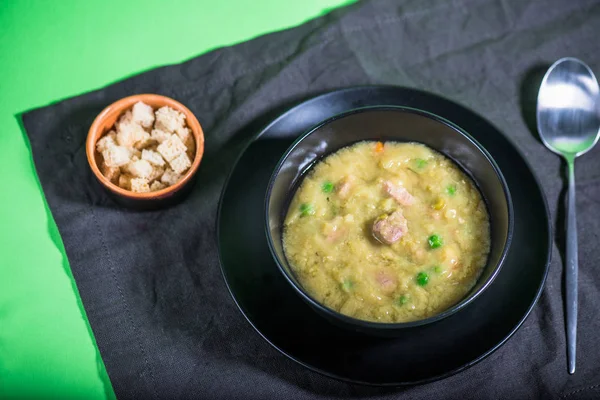 Homemade soup with croutons on black tablecloth — Stock Image Homemade Soup Croutons Black Tablecloth Royalty Free Stock Photos