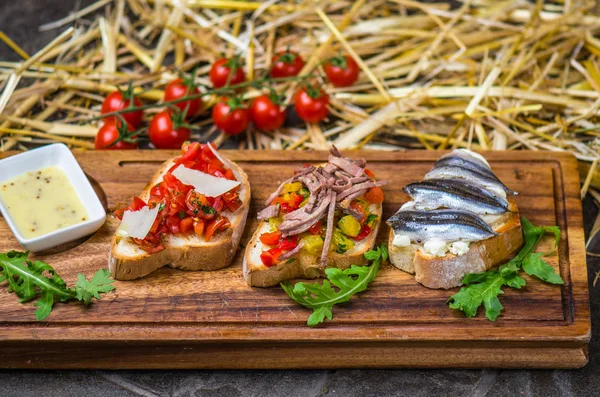 Bruschetta Snacks Vegetables Anchovy Served Wooden Board — Stock Photo, Image