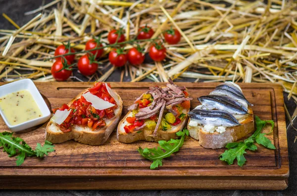 Bruschetta Snacks Vegetables Anchovy Served Wooden Board — Stock Photo, Image