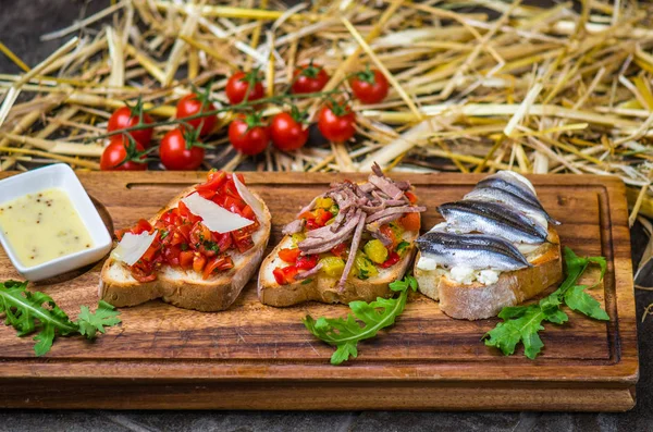 Bruschetta Snacks Vegetables Anchovy Served Wooden Board — Stock Photo, Image