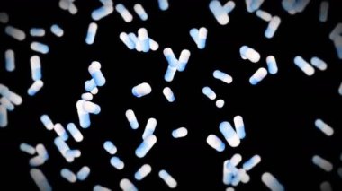 Siyah arka planda bir sürü tıbbi kapsül uçurmak. Tıp ve eczacılık konsepti. Mavi hap kapsülünün 3 boyutlu animasyonu dönüyor. Döngü canlandırması.