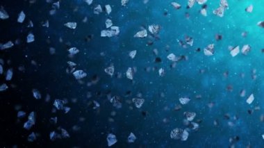 Uzayın derinliklerinde birçok asteroit uçuyor. Kırık sıçrama patlaması. Yıldızlı gökyüzü. Dönen meteorların 3 boyutlu animasyonu. Döngü canlandırması.