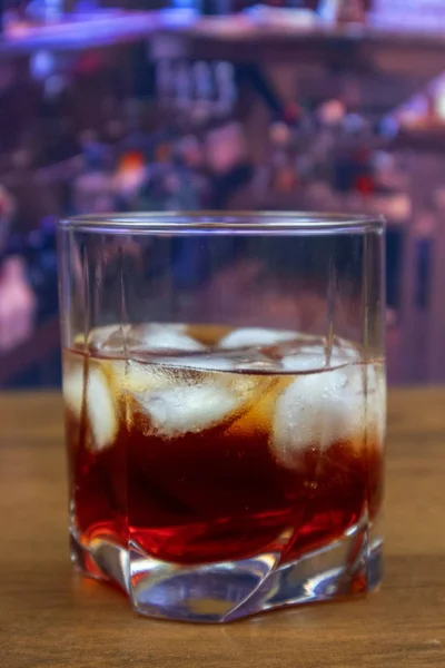 Americano cocktail in tumbler glass with ice