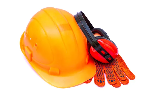 Orange helmet for the builder as a means of protection at a construction site on a white background. — Stock Photo, Image