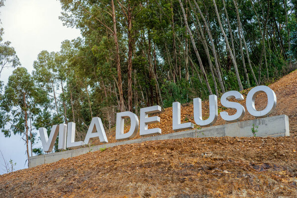 Sign with name of the village called Luso - place known for mineral water in Portugal