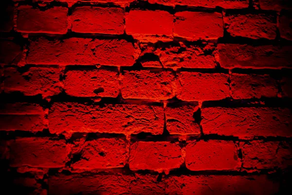 dark red brick wall with round shape light effect and shadow,