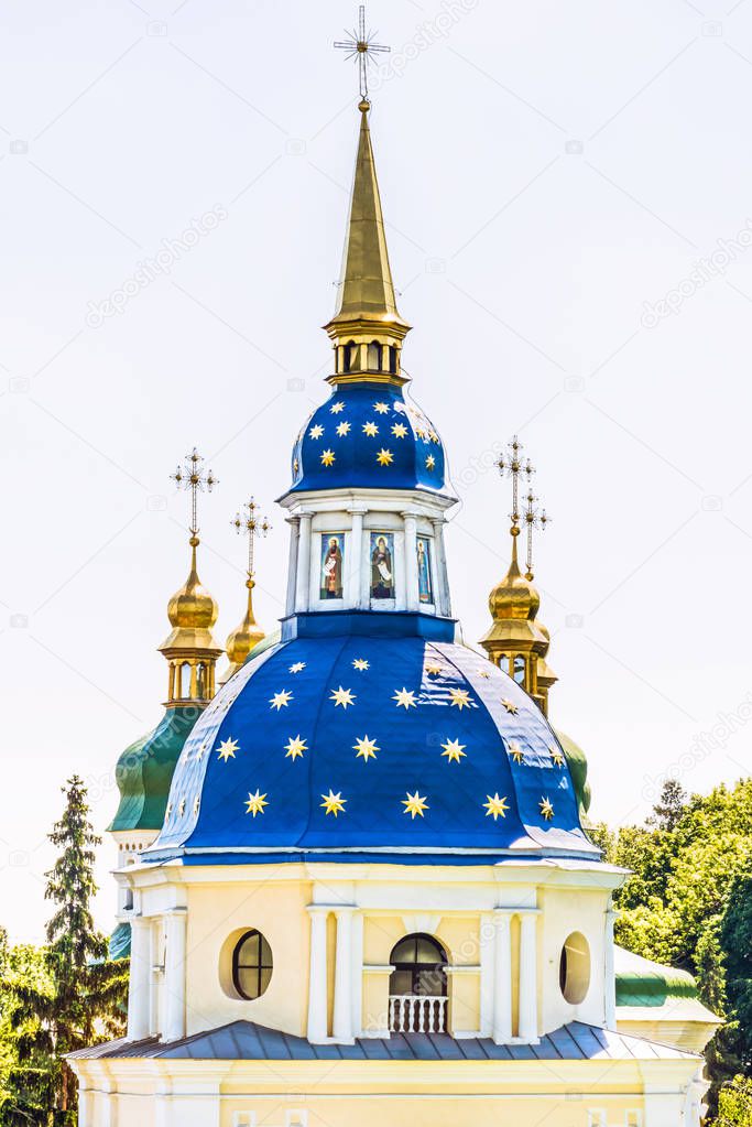 Fragment of the bell tower of the Vydubitsky male monastery in the Kiev Botanical Garden, Ukraine.