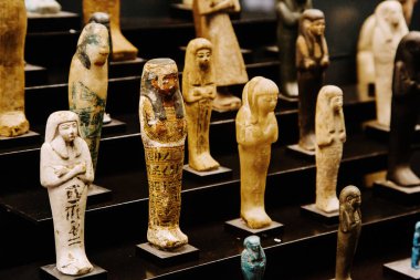 Vatican, Rome, Italy - March 13, 2015: Ancient Egyptian pharaoh statues in the Vatican Museum. clipart
