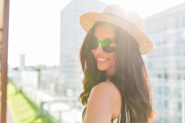 Excited smiling woman fooling around during summer weekend. glamorous female model in trendy outfit enjoying photoshoot — Stock Photo, Image