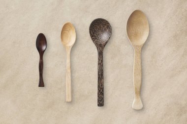 Mutfak eşyaları izole kahverengi kağıt doku arka plan üzerinde