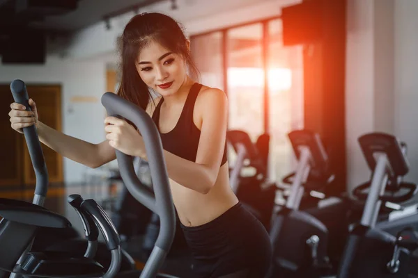 Asian Woman Exercise Elliptical Cardio Running Workout Fitness Gym Taking — Stock Photo, Image
