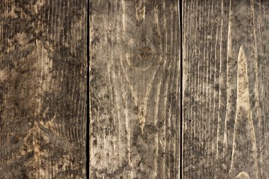 kahverengi-siyah ahşap kurulları bir doku ile