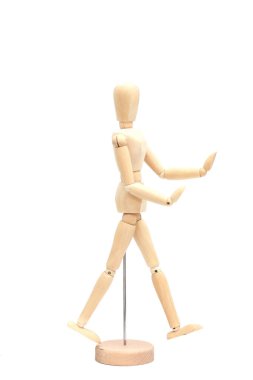 ahşap bebek farklı teşkil etmektedir. ahşap şekil kavramları. Beyaz arka plan üzerinde izole şekil