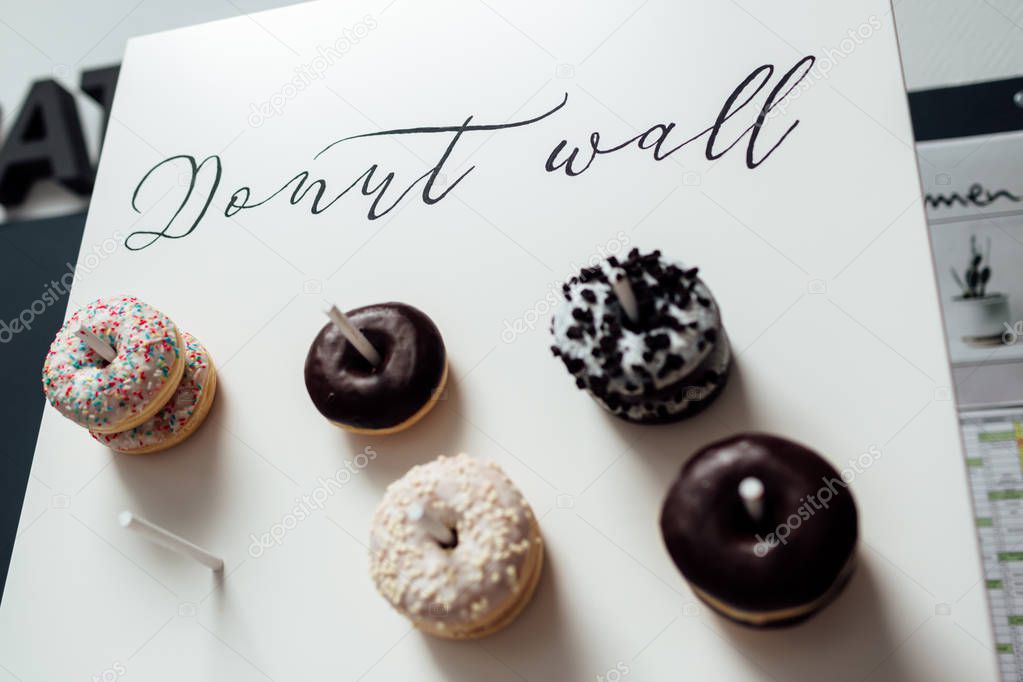 wedding chocolate donuts for guests. festive concept. sweets on a wedding day. wedding donuts