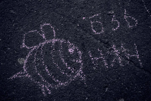Bee. Honeybee. Apis. Children drawing. Drawings chalk on the  asphalt.