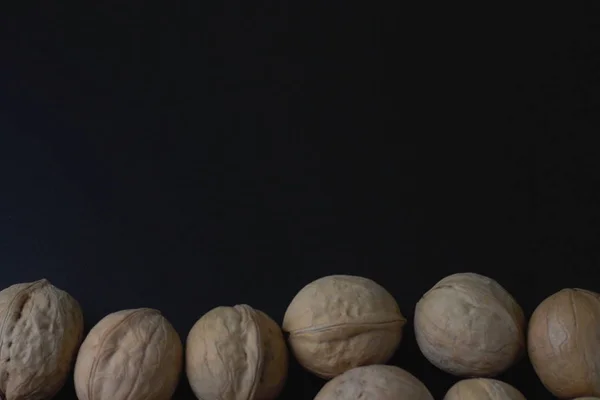 Natural Walnut Dark Background Copy Space Top View — Stock Photo, Image