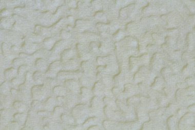 İnce sıkıştırılmış kağıdın yüzeyi arka plan olarak sarı-gri renk tonudur. Evrensel yeniden adlandırma için mükemmel kabartma deseni.