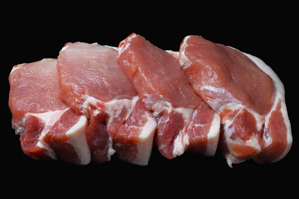 Grote Brokken Rauwe Varkenssteaks Een Zwarte Achtergrond Keto Dieetingrediënten Isoleren — Stockfoto