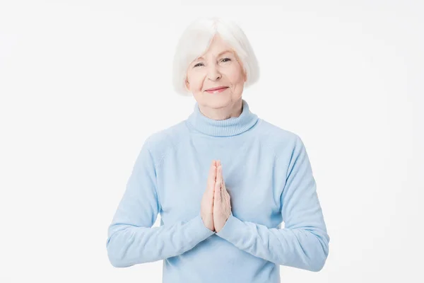 Senior Woman Praying Hands Together Standing Isolated White Background — Stock Photo, Image