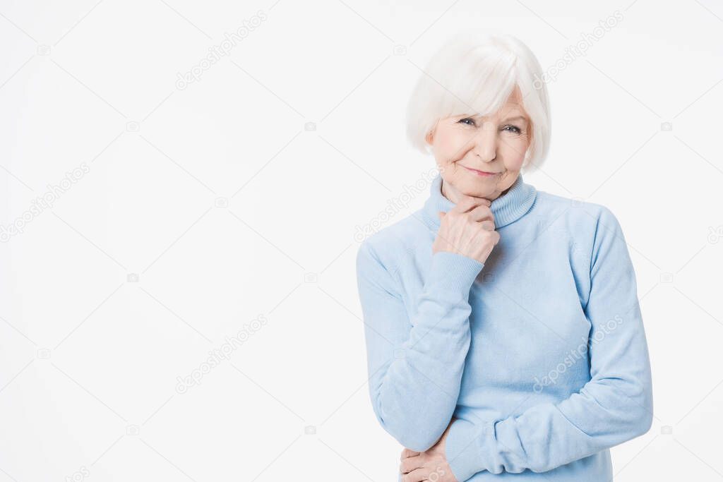 Portrait of senior caucasian woman isolated over white background