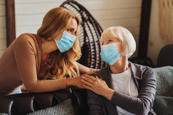 Senior Woman Caring Daughter Home Females Wearing Medical Masks Royalty Free Stock Photos