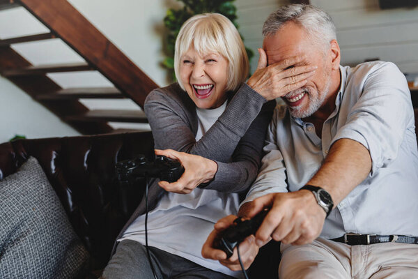 Couple Caucasian Retired Seniors Playing Video Games Together Home Stock Photo