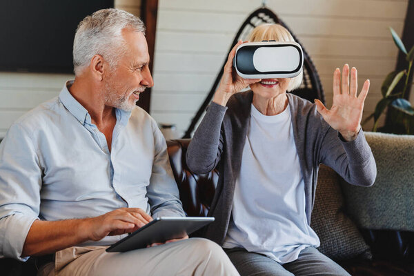 Old Elderly Retired Woman Using Virtual Reality Headset Apartment Royalty Free Stock Images
