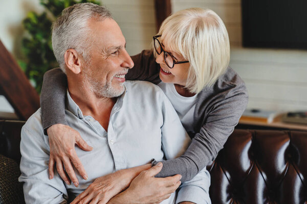 Senior Couple Hugging Looking Each Other Love Living Room Home Stock Image