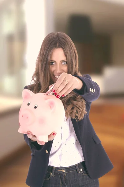Beautiful Hispanic Businesswoman Holding Piggy Bank — Stock Photo, Image