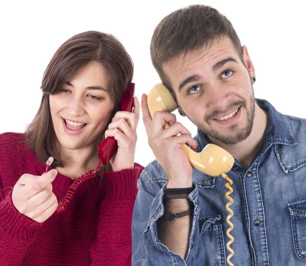 Portræt Unge Par Med Vintage Telefoner Hvid Baggrund - Stock-foto