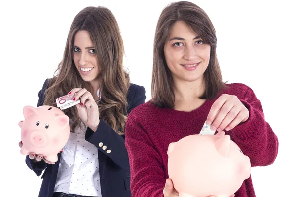 Two Happy Women Studio Piggy Banks Money Cash — Stock Photo, Image